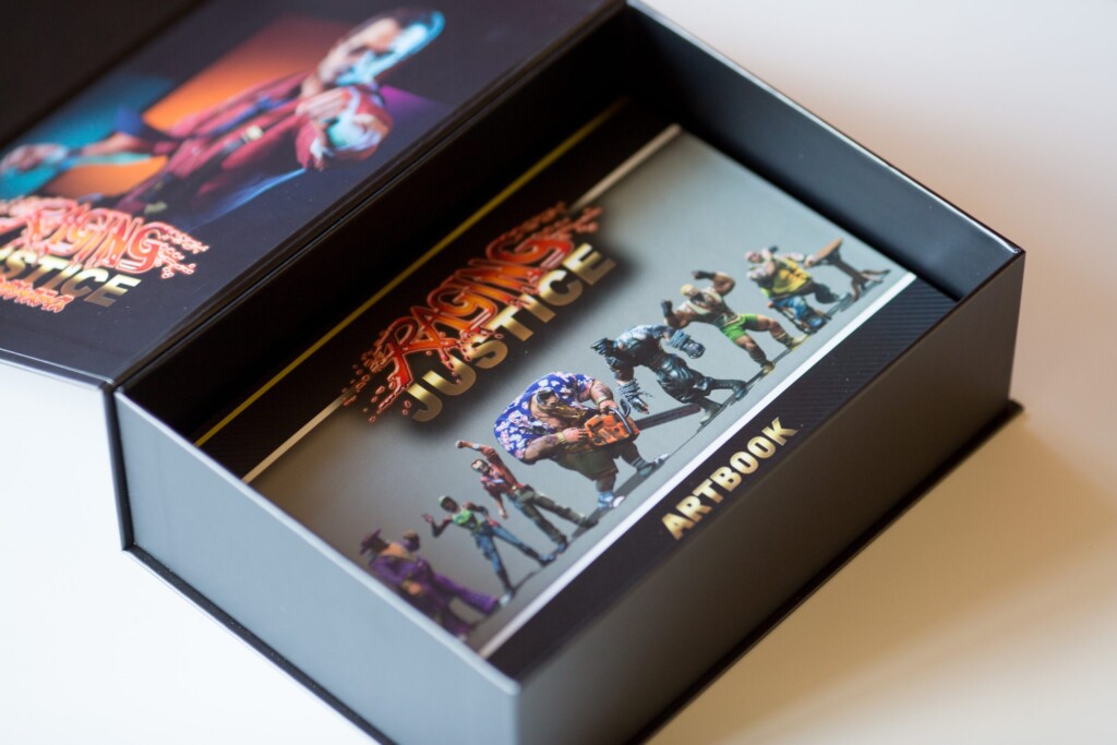 Raging Justice Collection Edition rigid box containing artbook and game materials, with foil-stamped cover lettering and