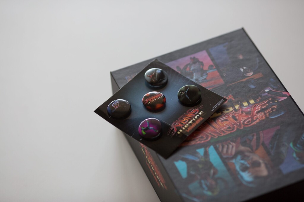 Raging Justice Collection Edition rigid box with dark artwork containing five sphere-shaped objects and a game component on