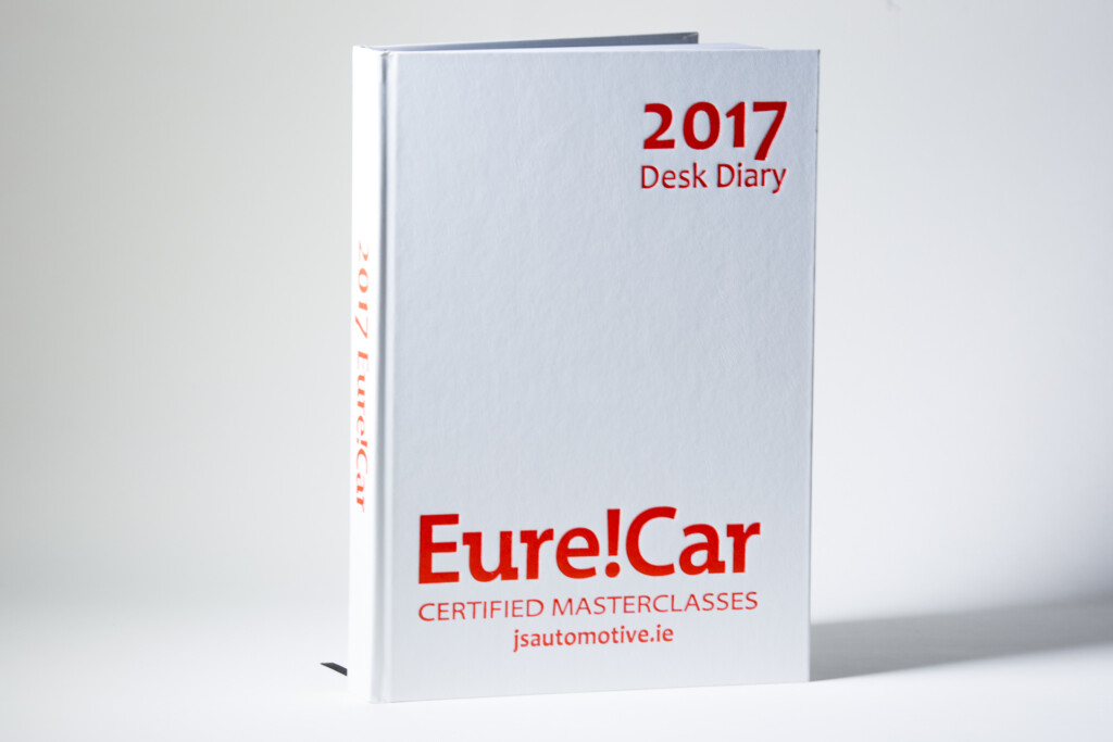 2017 Eurecar desk diary with white cover and red text, standing upright showing spine and front cover.