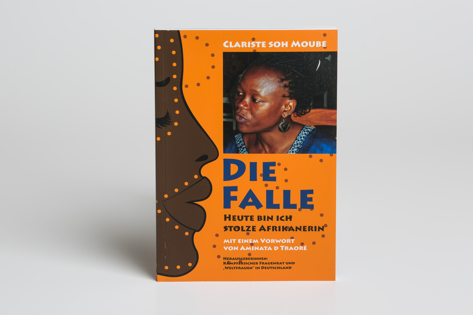 German-language softcover book titled "Die Falle" with orange and brown cover design featuring a portrait photograph and