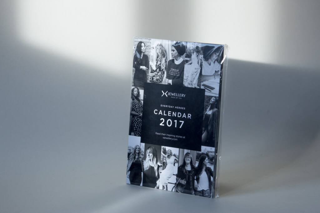 Hardcover calendar 2017 with black and white photographic cover, standing upright in studio lighting.