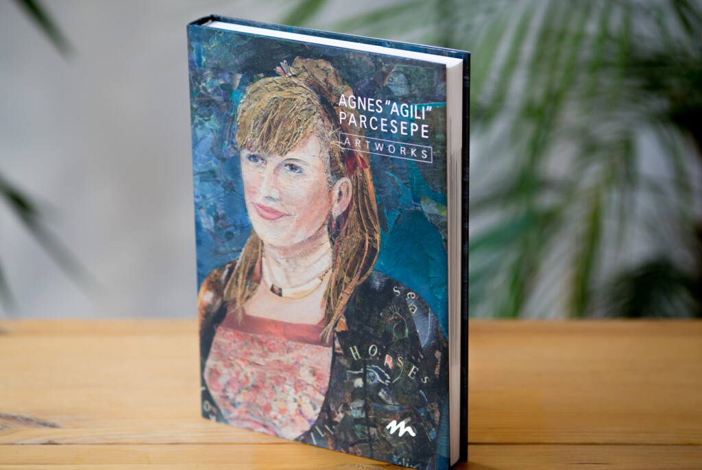 Hardcover book with blue cloth spine featuring portrait painting of a woman and text reading "AGNÈS 'AGILI' PARCESEPE
