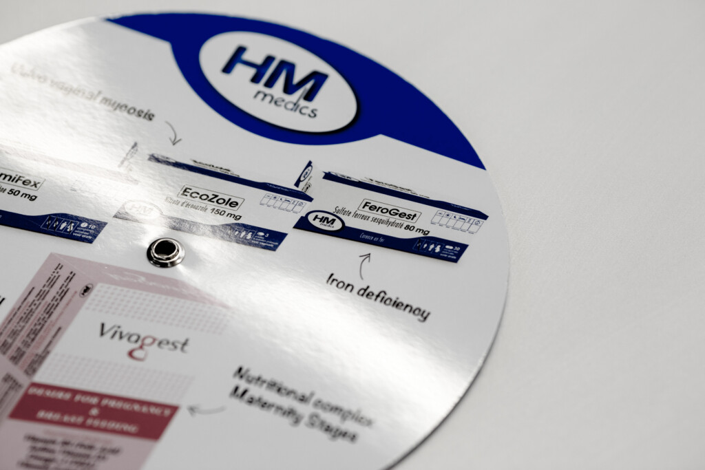 HM Protect pregnancy calendar disc with nutritional information and reference guide printed on white card stock.